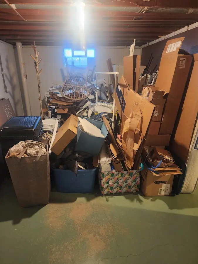 Roll-off dumpster container at job site for 4 Yard Dumpster Rental in Plattsburgh